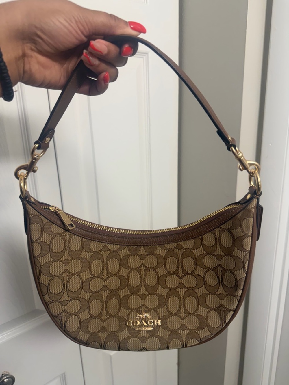 Coach Brown Signature Crescent Shoulder Bag with Gold Hardware